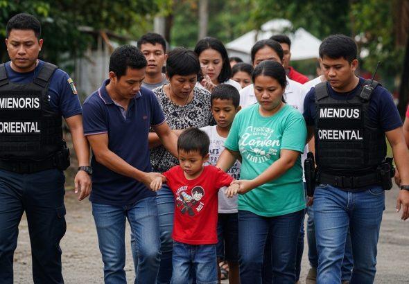 Authorities escorting minors to safety in Davao Oriental, Philippines.